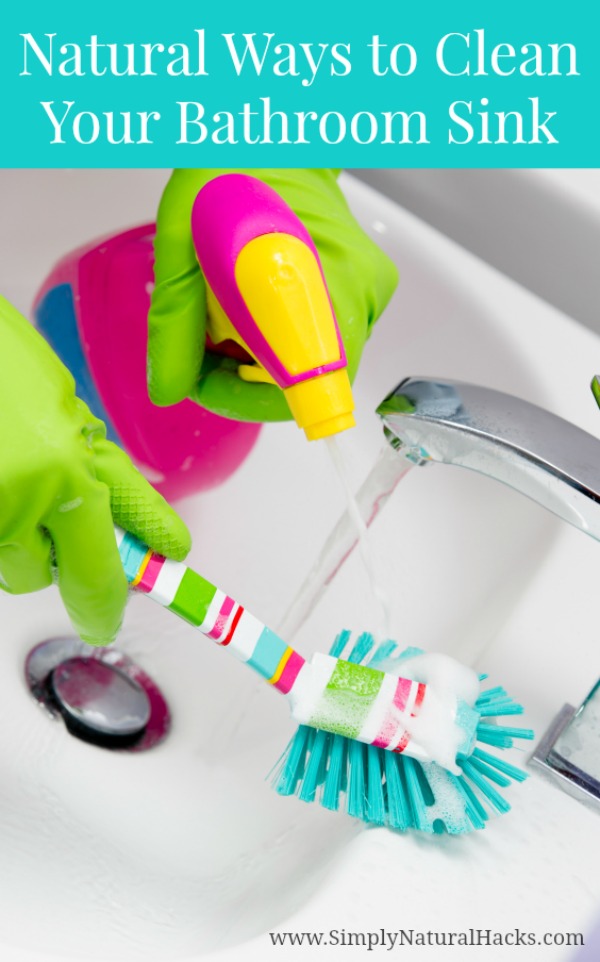 bright cleaner and brush in bathroom sink